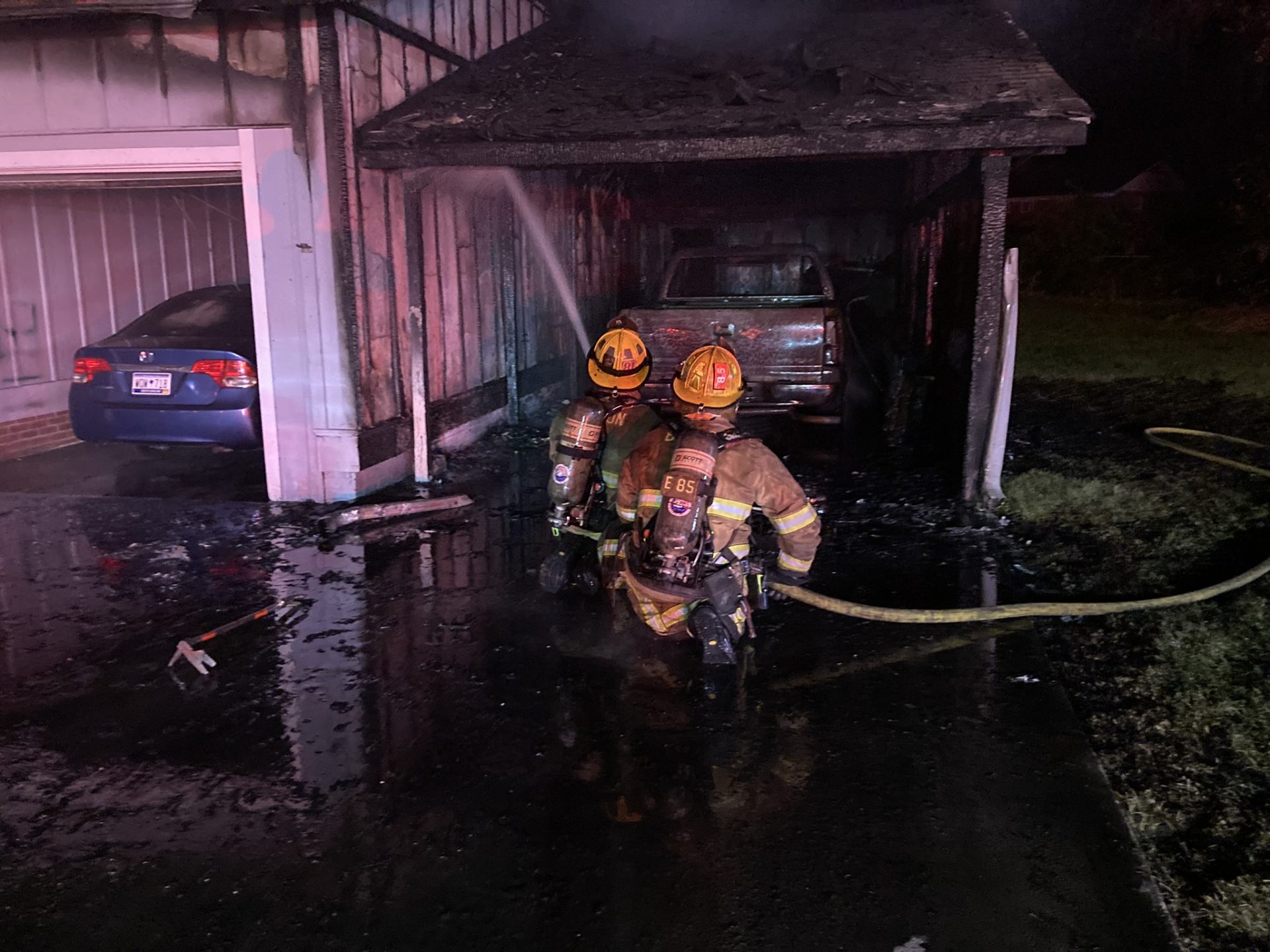 Late Tuesday, July 26, the Burton Fire District, Parris Island Fire Department, Beaufort County EMS and the Beaufot County Sherriff’s Office responded to a house fire on Walnut Street which displaced a family of four adults. Photos courtesy of Burton Fire District