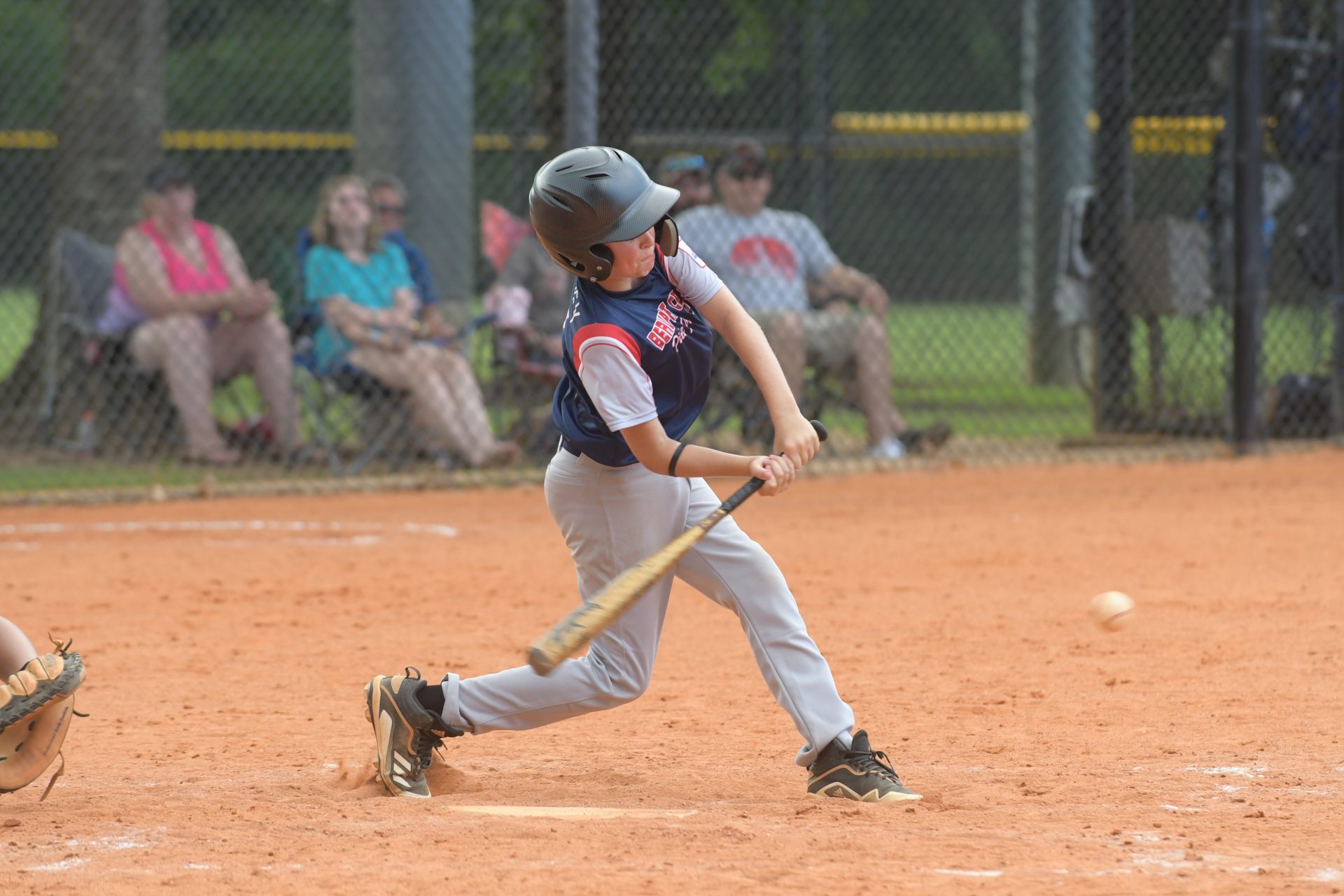 Beaufort County 13-and-under all-star Rylan McGarvey goes down to get a pitch during an 11-4 win over Oconee County in the championship game of the Dixie Junior Boys state tournament. The team finished 3-1 and claimed the state title. Justin Jarrett/LowcoSports.com