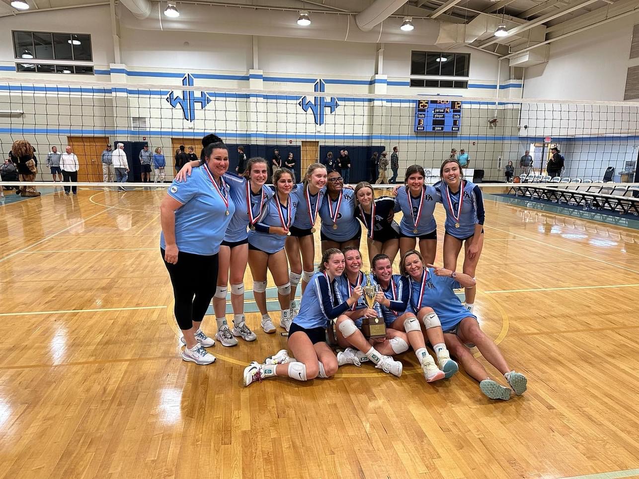 The Beaufort Academy volleyball team poses Monday night with its trophy after beating The King’s Academy, 3-1, at Wilson Hall in Sumter, to win the SCISA 2A state championship. Submitted photo