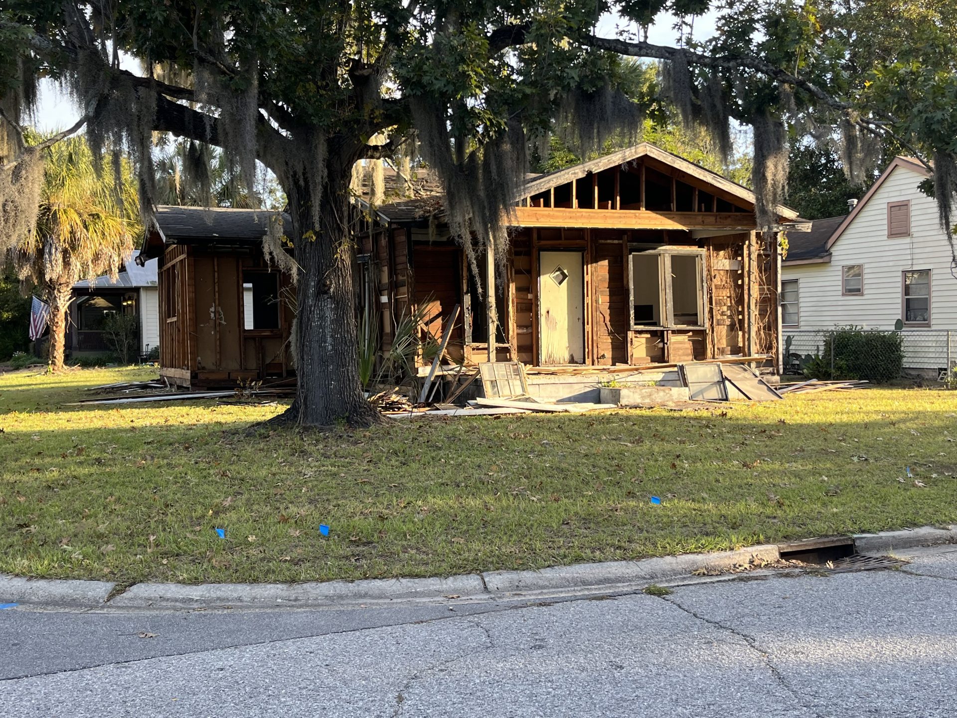 A house at 811 Congress Street in the Northwest Quadrant was in the process of being taken apart Monday morning, Oct. 23 until City building inspectors put a stop/work order on the residential property for not having a demolition permit. Lolita Huckaby, The Island News