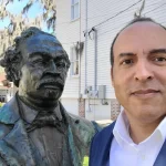 Michael B. Moore poses with the bust of his great-great-grandfather — Beaufort native, Civil War hero and Reconstruction-era Congressman Robert Smalls — at Tabernacle Baptist Church in Beaufort. Submitted photo