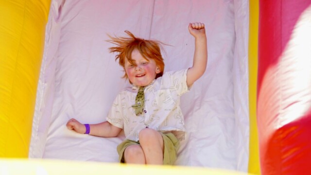 Beaufort’s Willie Johnson, 4, quickly slides down a bouncy house slide in the fun zone at the Beaufort Academy Egg Drop on Sunday, March 22, 2026. Amber Hewitt/The Island News