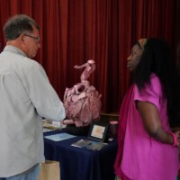 Charleston-based multimedia artist Lyela Gadsden tells how she created her art piece titled "Roseate Recycle Receptacle" during the Gullah/Geechee CREATE Showcase 2026 presented by Darrah Hall -- Reconstruction Era National Historical Park on Saturday, March. 28, 2026. Gadsden won first place for her artwork. Amber Hewitt/The Island News
