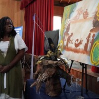 Priscilla Brockington, a Gullah Geechee artist from Georgetown, S.C., tells about her powerful piece “Sankofa Flight” during the Gullah/Geechee CREATE Showcase 2026 presented by Darrah Hall - Reconstruction Era National Historical Park on Saturday, March. 28, 2026. Brockington won second place for her art piece. Amber Hewitt/The Island News