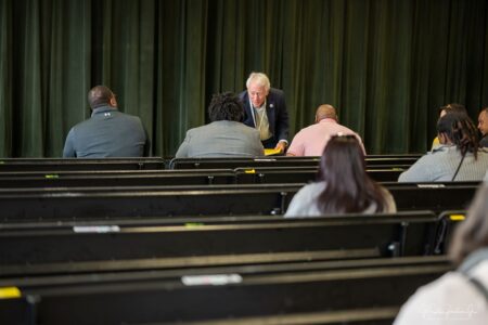 Beaufort County Board of Education members Richard Geier and William Smith greet at the start of St. Helena Elementary School’s annual Leader In Me celebration. Submitted photo